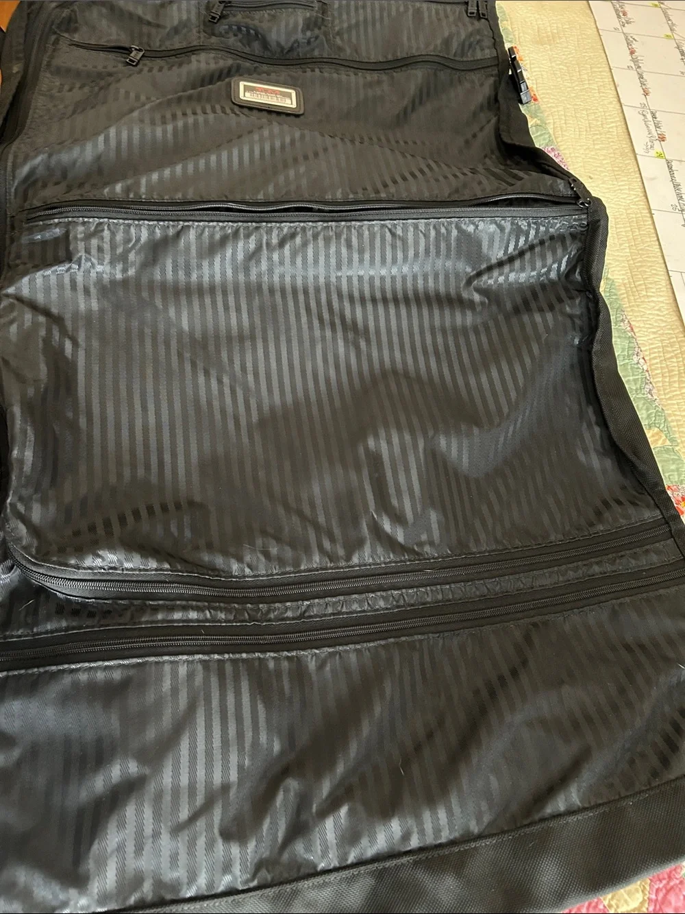 Tumi leather luggage